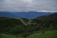 Le vallon du ruissseau d'Estibos, au fond, la vallee d'Argeles Gazost